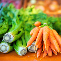 Fresh fennel and carrots on agricultural market