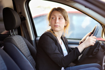 Young woman in a car