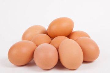 Chicken eggs  on white paper background