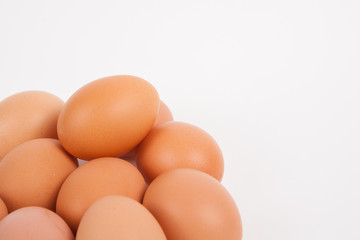 Chicken eggs  on white paper background