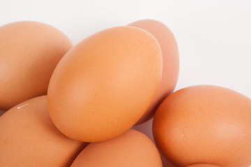Chicken eggs  on white paper background