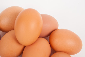 Chicken eggs  on white paper background
