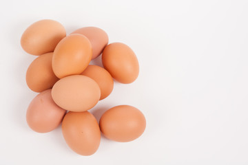 Chicken eggs  on white paper background