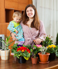 Mother and baby with flowering plants