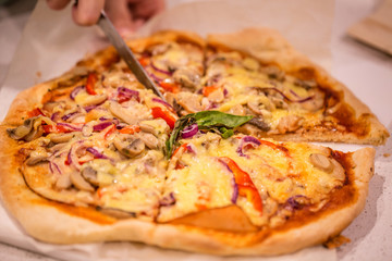 Homemade pizza on white table