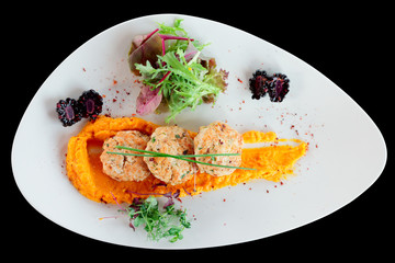 White meat patty cakes with pumpkin mash, isolated