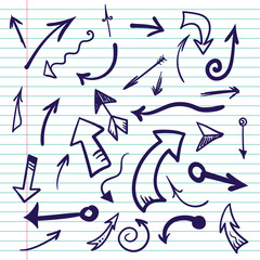 Hand drawn doodle arrows on lined paper