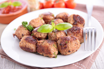 fried meatball and tomato sauce