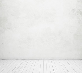 White concrete wall and wood floor