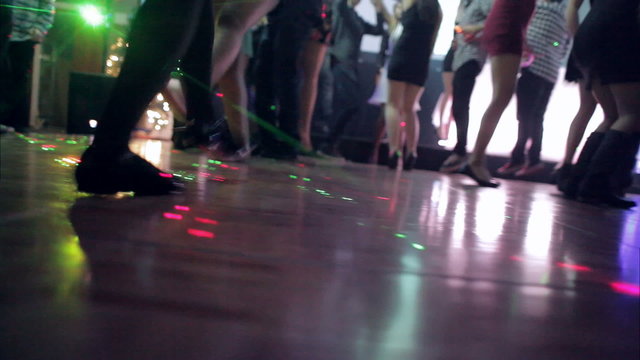 Low Angle of Young People Jumping and Dancing on the Dance Floor