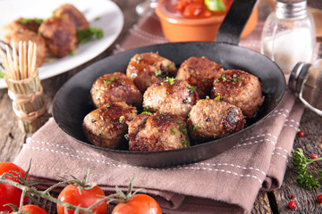 fried meatball and tomato sauce