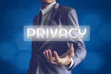 Businessman or Salaryman with PRIVACY text modern interface conc