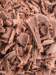 Close up view of dark brown chocolate pieces 