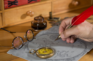 Adventurer drawing a map