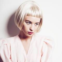Portrait of a beautiful blond woman with short hair