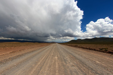 Fototapeta na wymiar Unpaved road in Andes