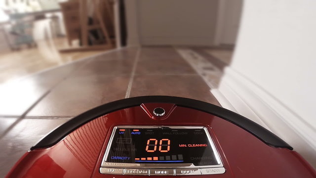 Automatic Vacuum Robot Cleaning the House Floor Itself. Camera mounted directly on the Sweeper.