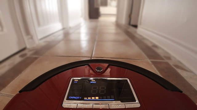 Automatic Vacuum Robot Cleaning the House Floor Itself. Camera mounted directly on the Sweeper.