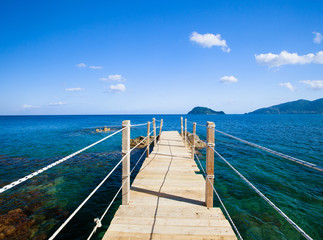 Obraz premium wooden bridge - sea, summer.