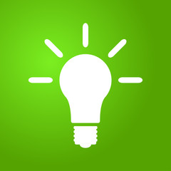 Light bulb icon on green background