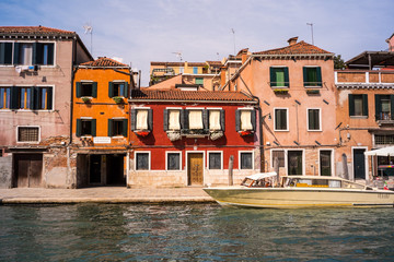 Fototapeta na wymiar Venice cityscape, narrow water canal.