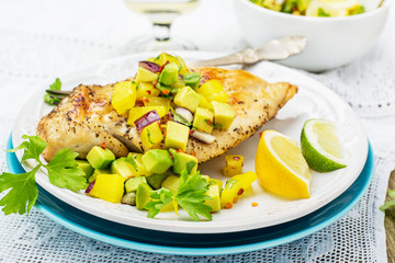 Grilled chicken breast with fresh mango salsa,