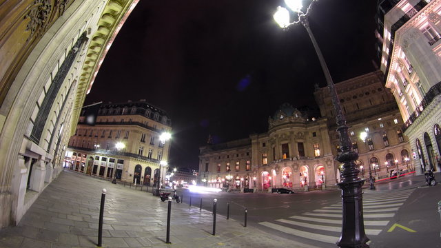 Traffic at the street near Opera National de Paris in the