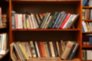 Many books on bookshelf in library