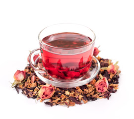 isolated transparent mug of red tea with dried rose