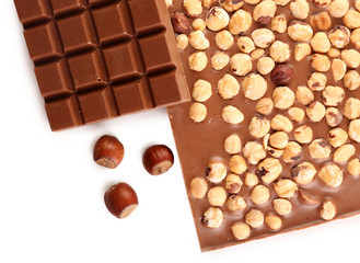 Chocolate bars with hazelnuts close up