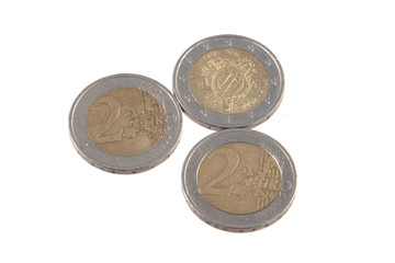 Euro coins on a plain white background.