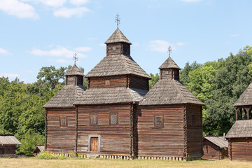 Fototapeta na wymiar Wooden antique orthodox church . Pirogovo museum, Kiev, Ukraine