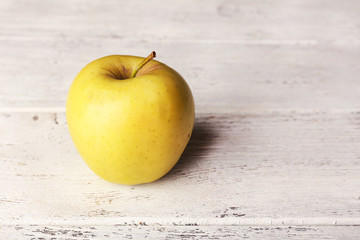 Apple on wooden background