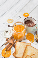 toast bread with jam on vintage wooden table