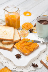 toast bread with jam on vintage wooden table