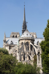 Fototapeta na wymiar The spire and east side of Cathedral Notre Dame , Paris
