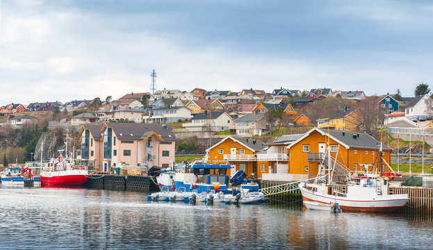 Fishing village, wooden houses and boats, Norway
