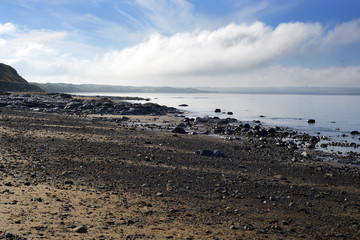 serene day over the black rocks