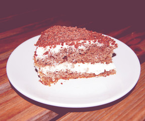 Dark Chocolate Sponge Cake  - vintage effect. Cafe photo with re