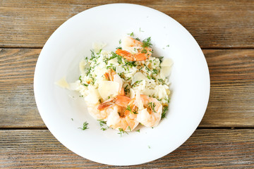 Tasty risotto with shrimp and dill