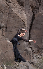 Flameco dancer in a basalt ravine