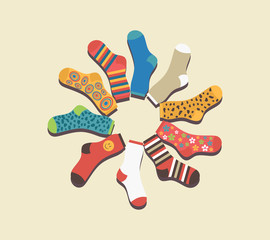 Vector colored socks in a circle on a beige background - 81019897