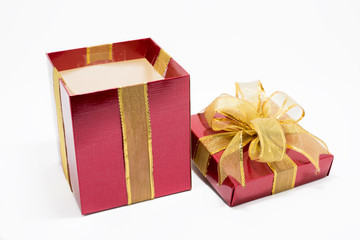 Red gift box with gold ribbon