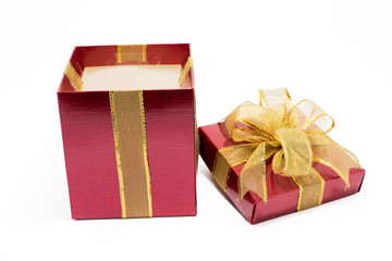 Red gift box with gold ribbon