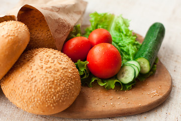 Hamburger ingredients on table