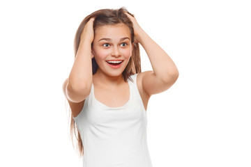 Surprised happy teenager girl looking to side in excitement