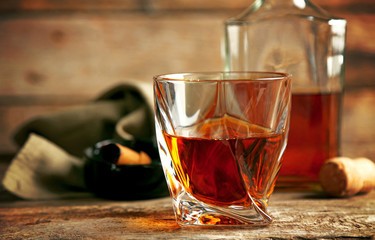 Whiskey on wooden background