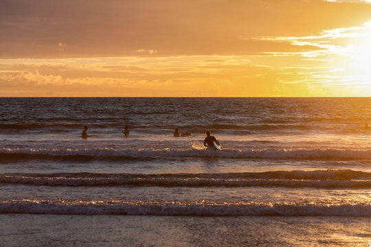 sunset on the ocean and serfer