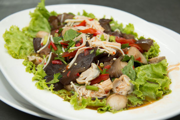 Spicy mushroom salad on plate