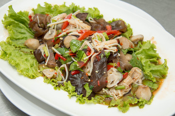 Spicy mushroom salad on plate